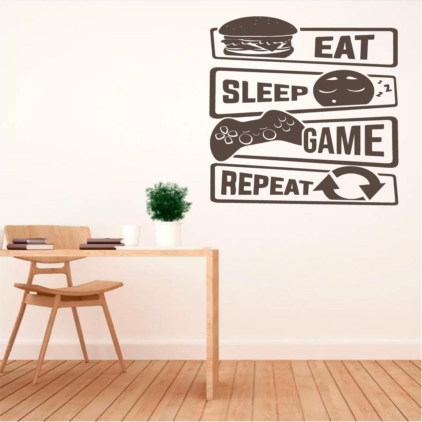 Brown Eat Sleep Game Repeat wall decal beside a wooden desk
