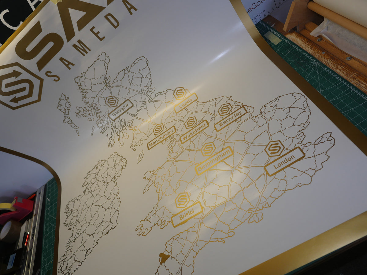 Gold UK locations map — prepared vinyl lettering or artwork, workshop photograph
