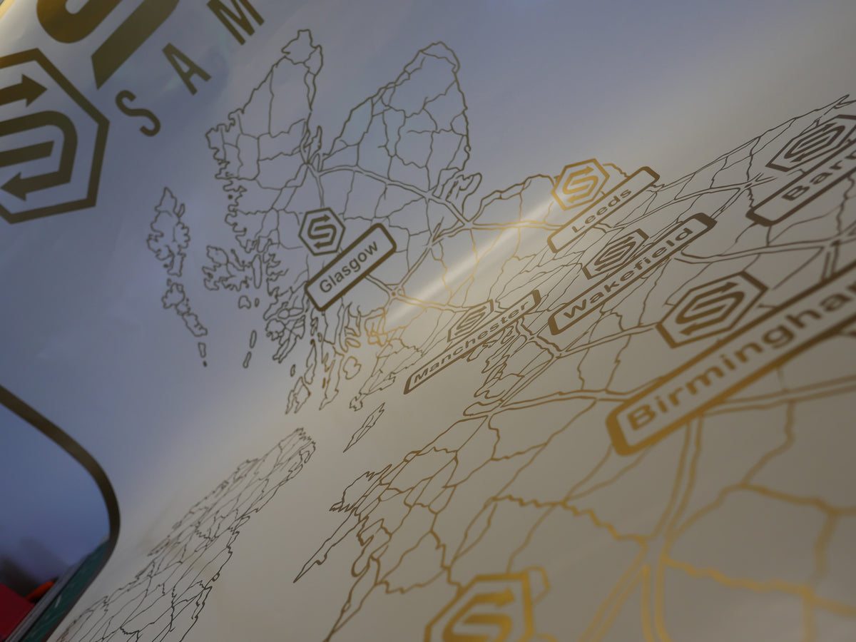 Gold UK locations map — prepared vinyl lettering or artwork, workshop photograph