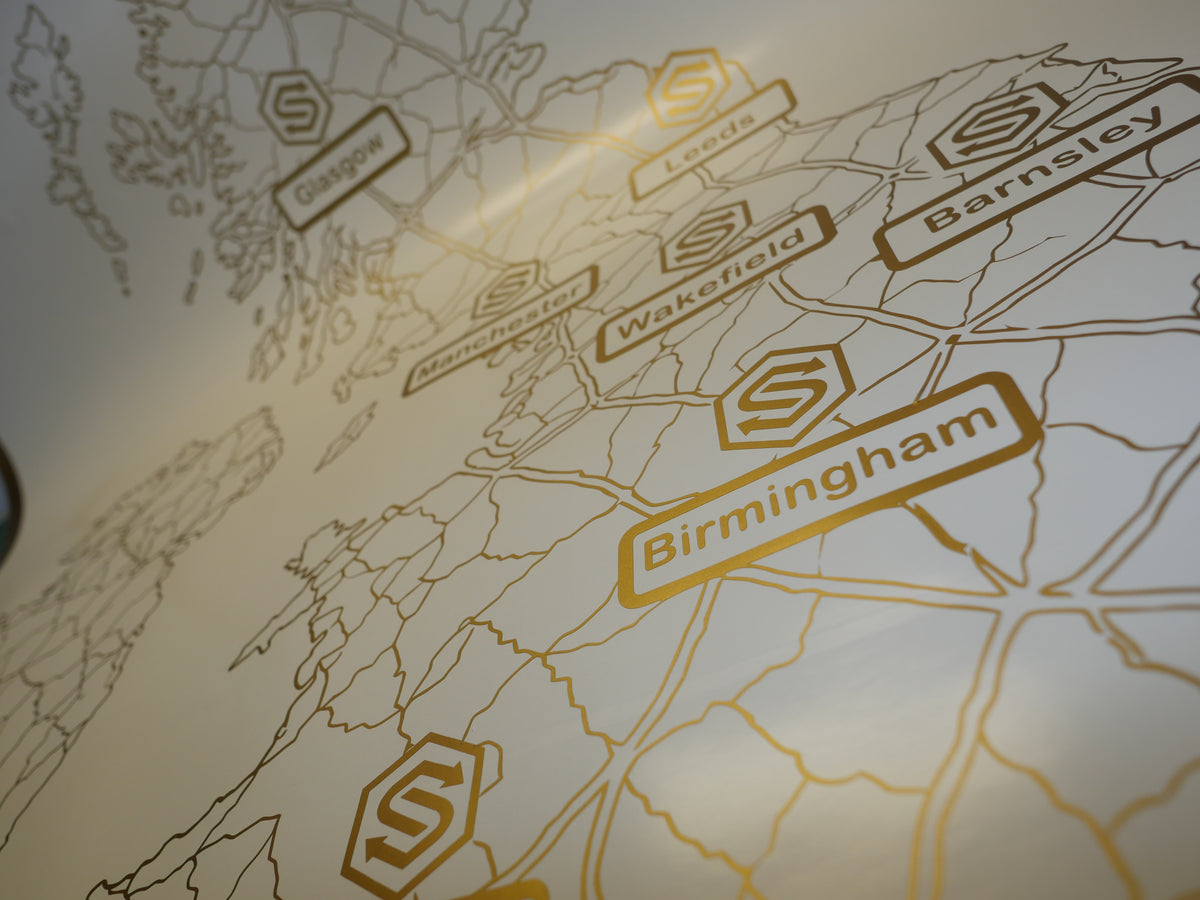 Gold UK locations map — prepared vinyl lettering or artwork, workshop photograph