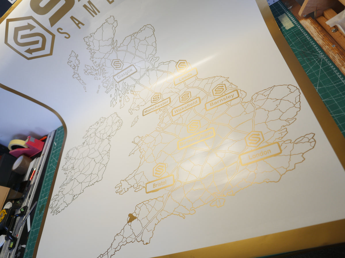 Gold UK locations map — prepared vinyl lettering or artwork, workshop photograph