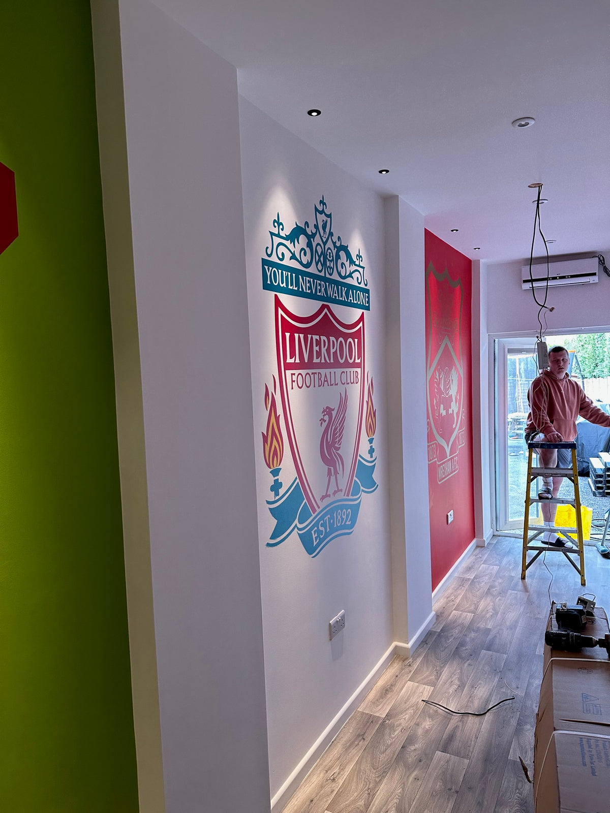 Sports feature walls installation — original project photograph