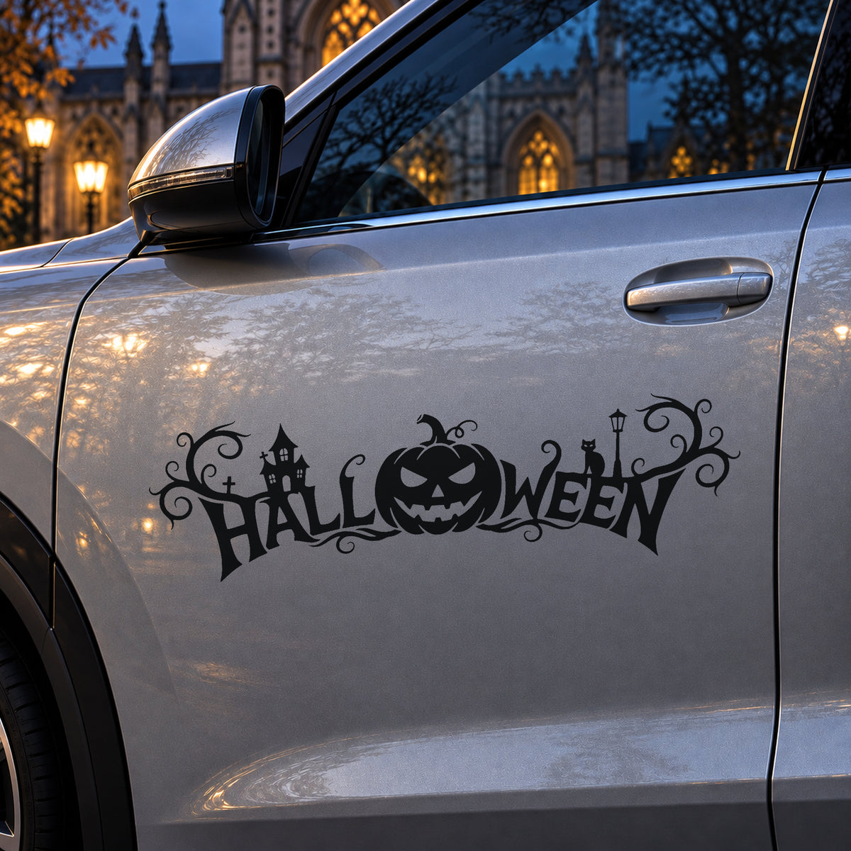 Black Halloween banner decal on a silver car door.