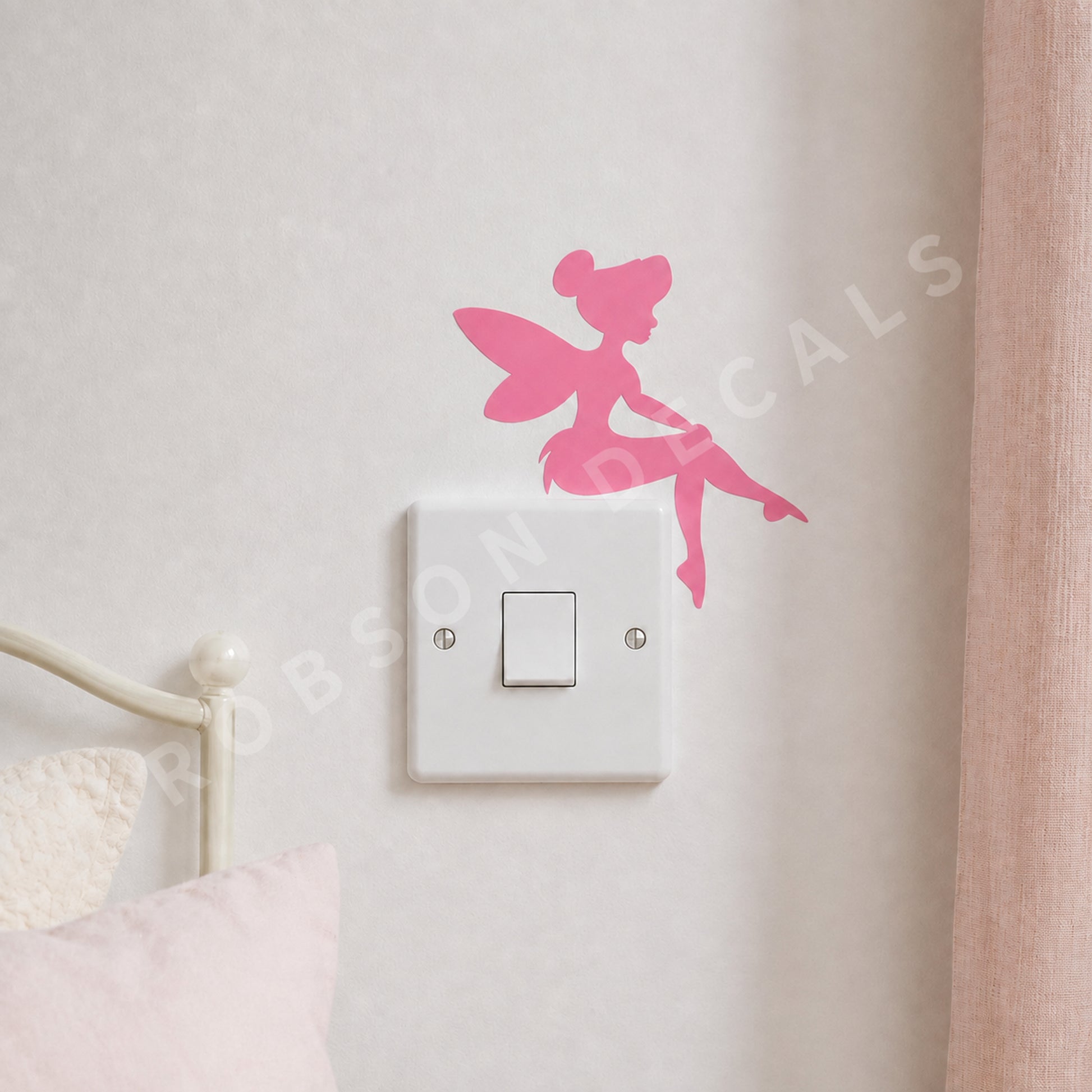Baby pink Little Fairy light-switch decal in a softly styled bedroom, with Robson Decals watermark.