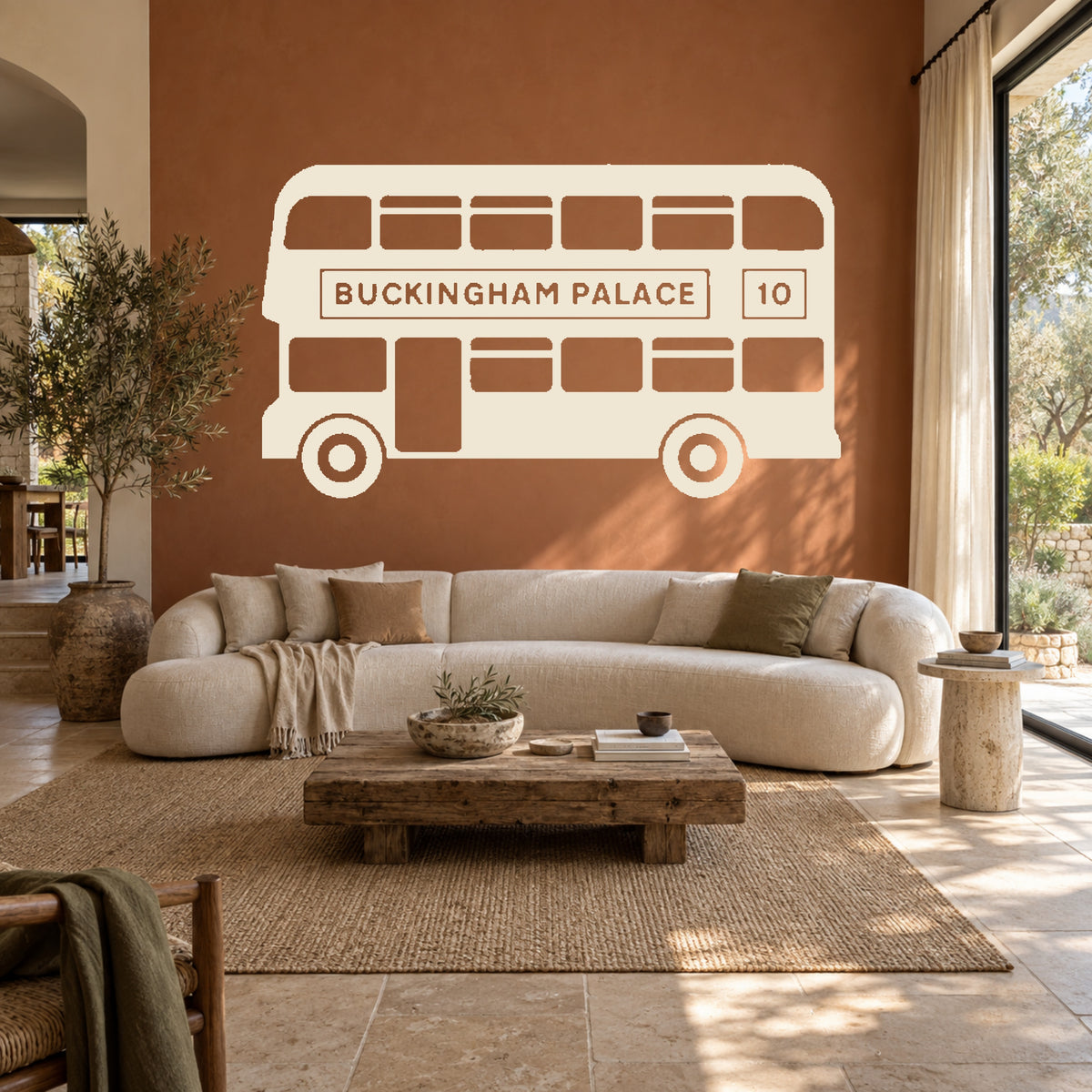 Cream single-colour London bus wall decal, including matching wheels, in a terracotta lounge. Buckingham Palace route 10.