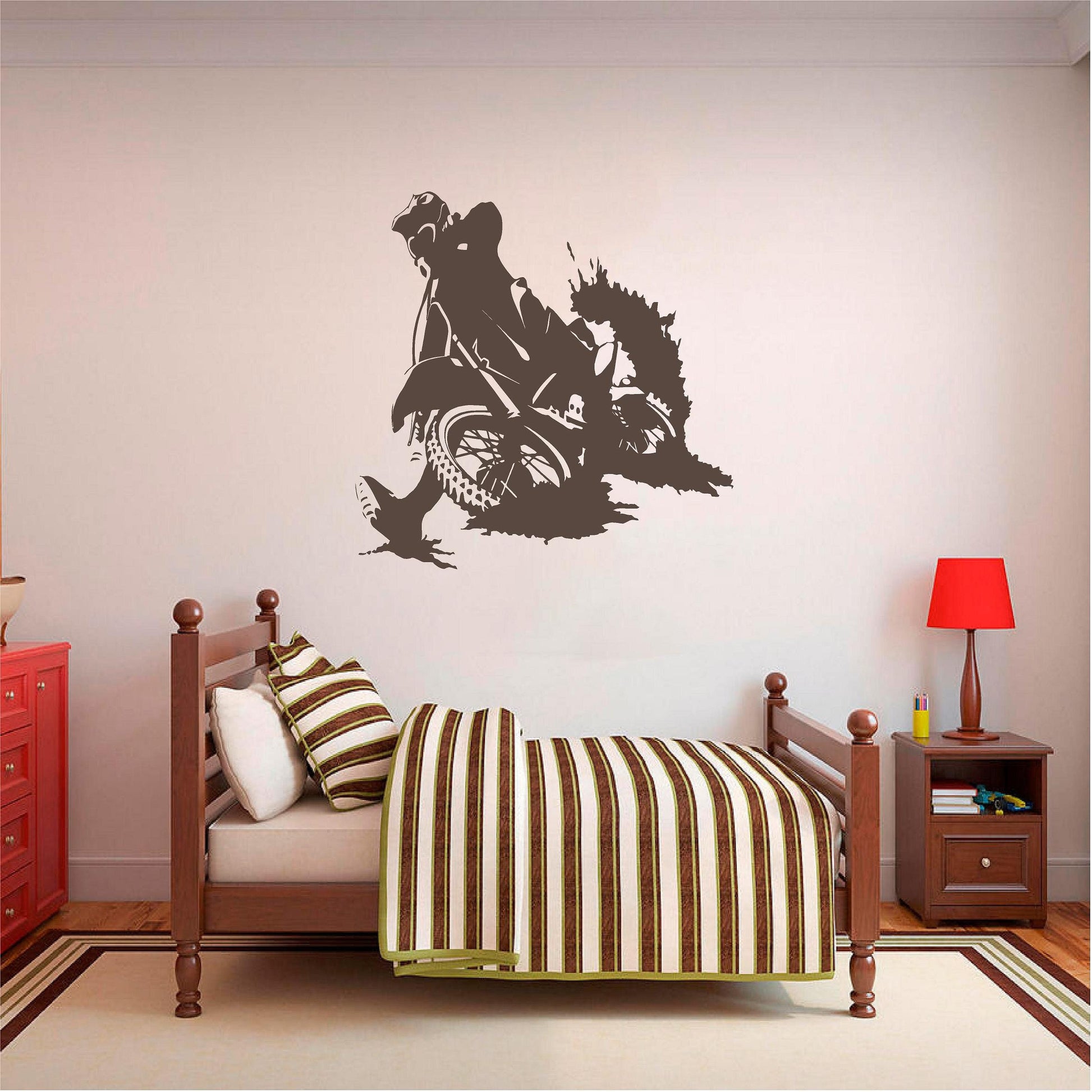 Brown motocross rally rider wall decal above a wooden bed
