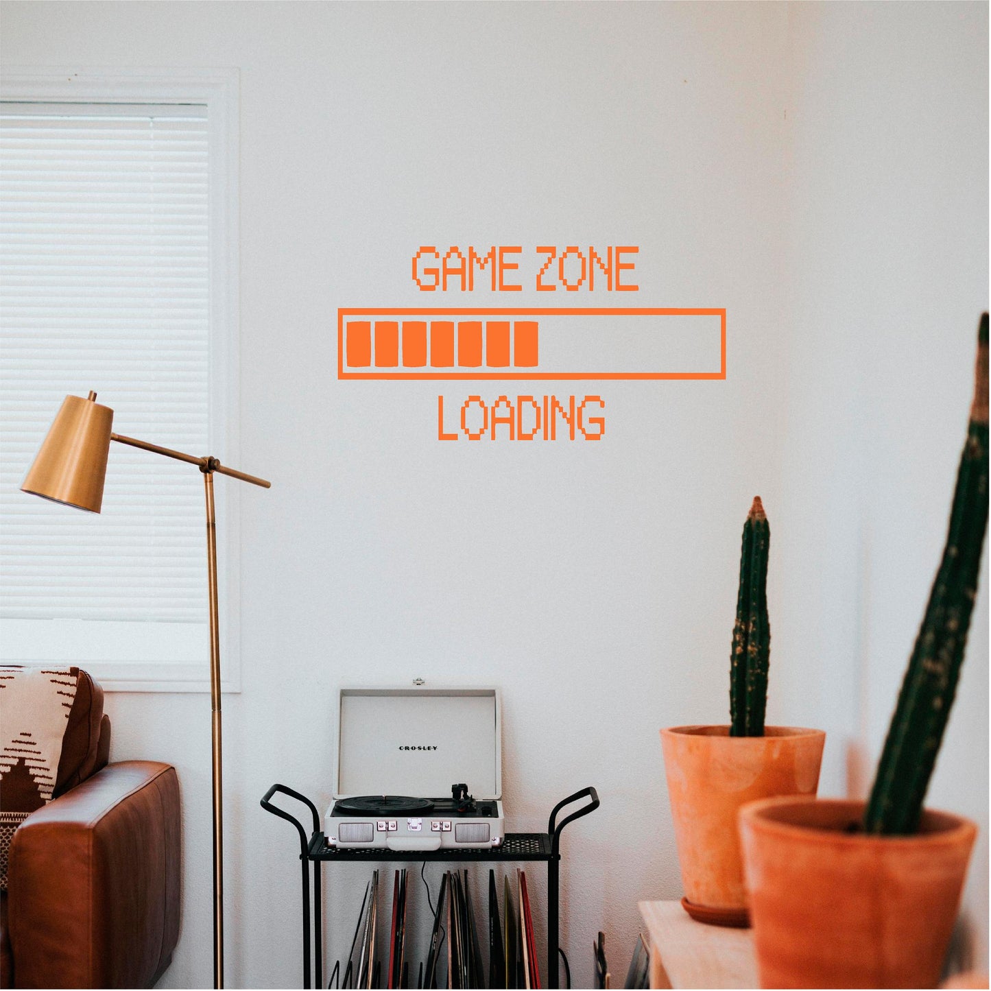 Orange Game Zone Loading wall decal above a record player