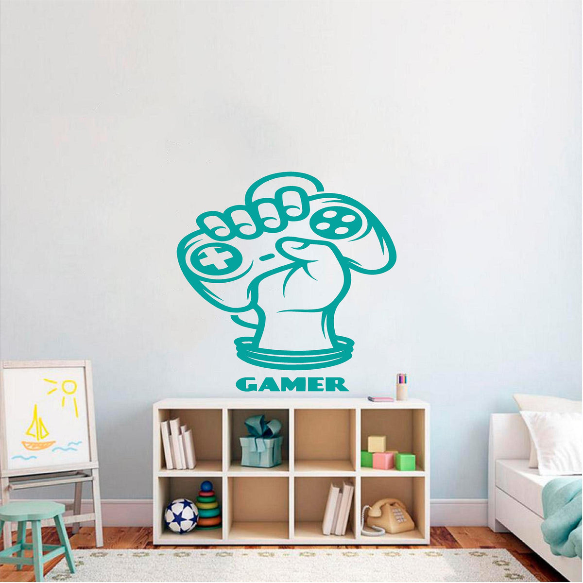 Turquoise Gamer Fist controller wall decal above a bedroom storage unit
