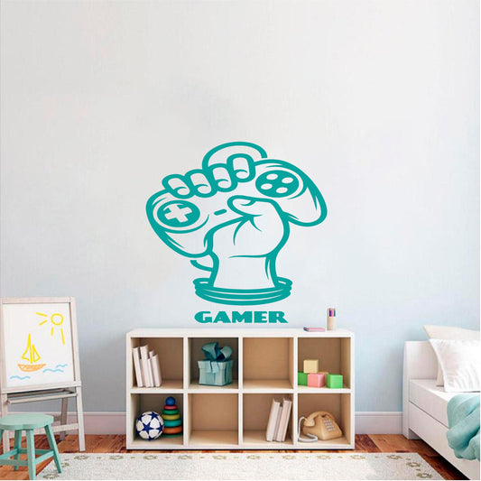 Turquoise Gamer Fist controller wall decal above a bedroom storage unit