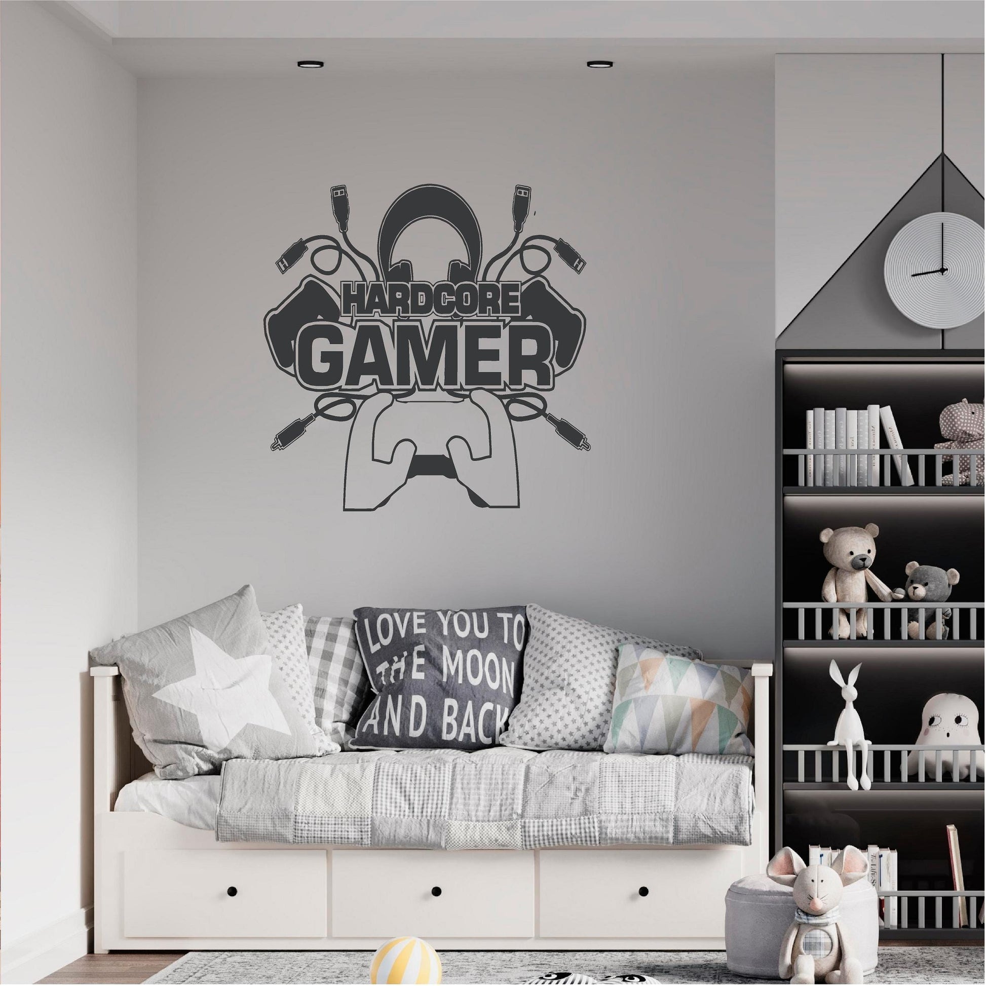 Dark grey Hardcore Gamer wall decal above a daybed