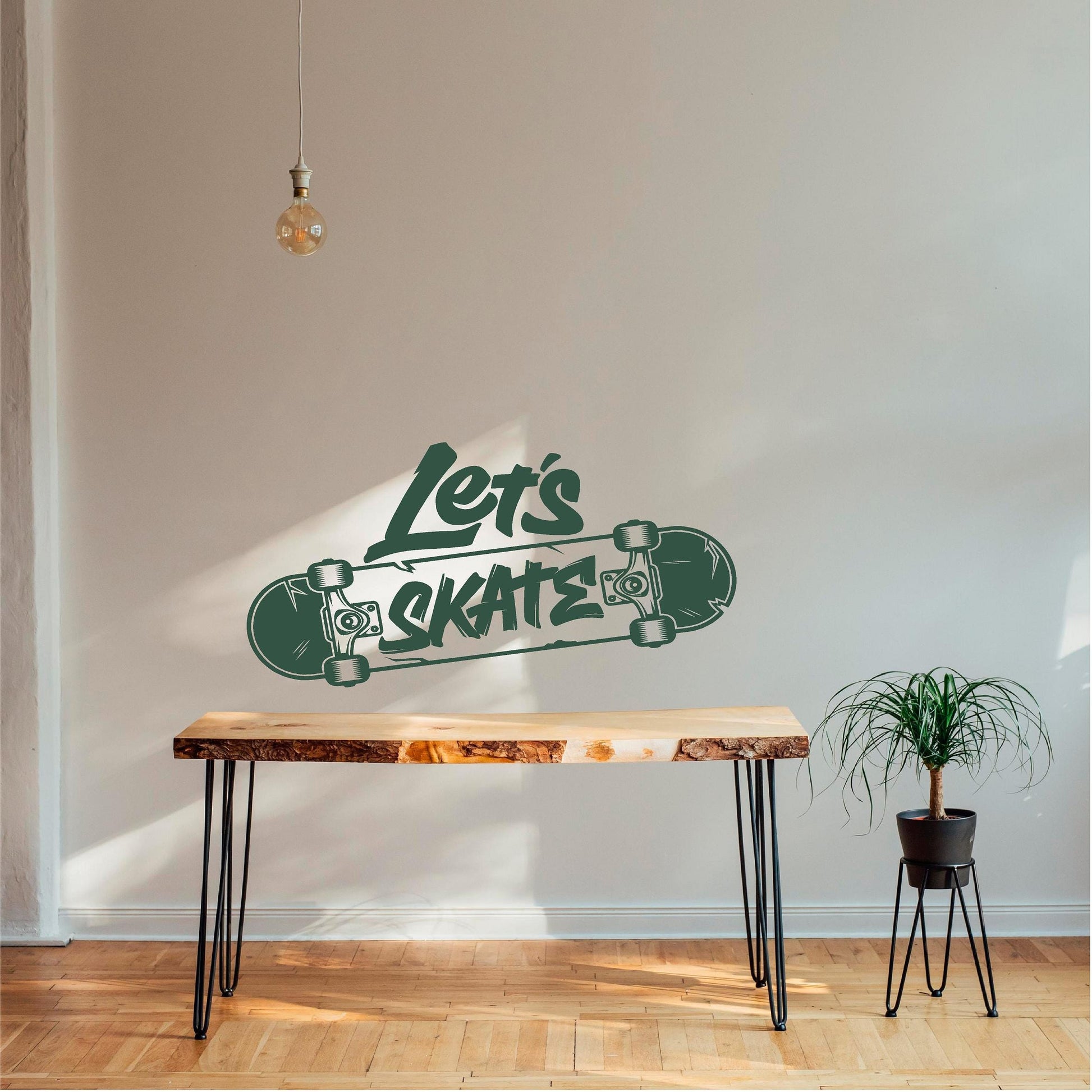 Green Let's Skate wall decal above a wooden table
