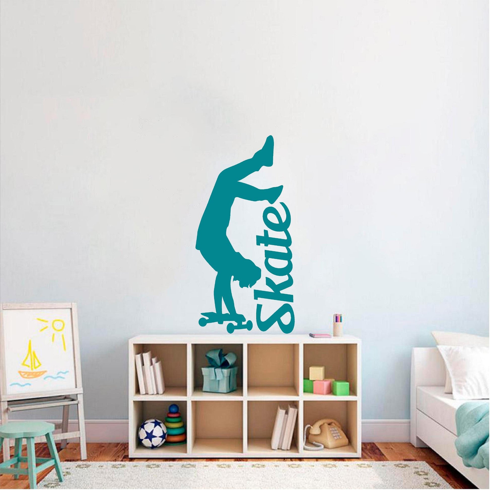 Teal handstand skater wall decal above a storage unit