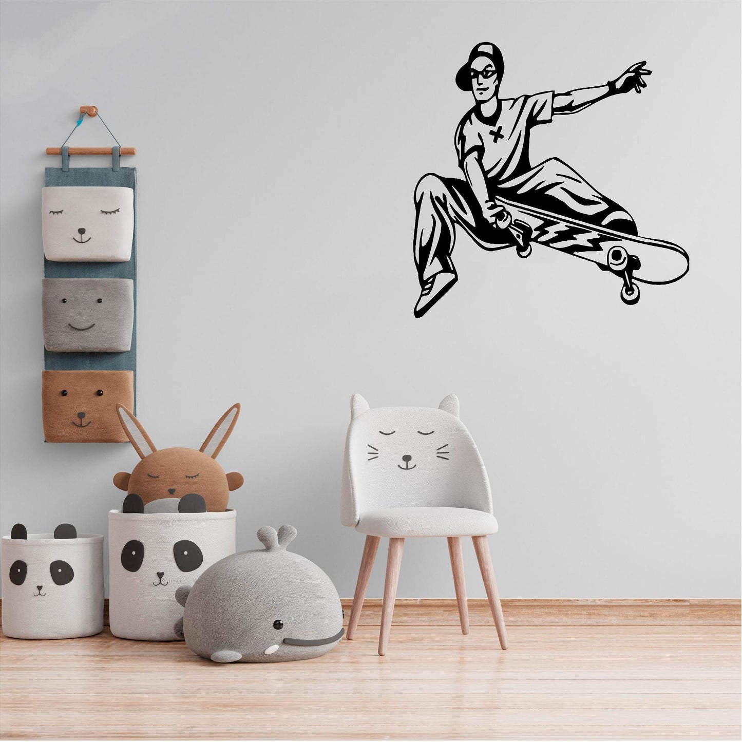 Black skateboarder trick wall decal in a child's room