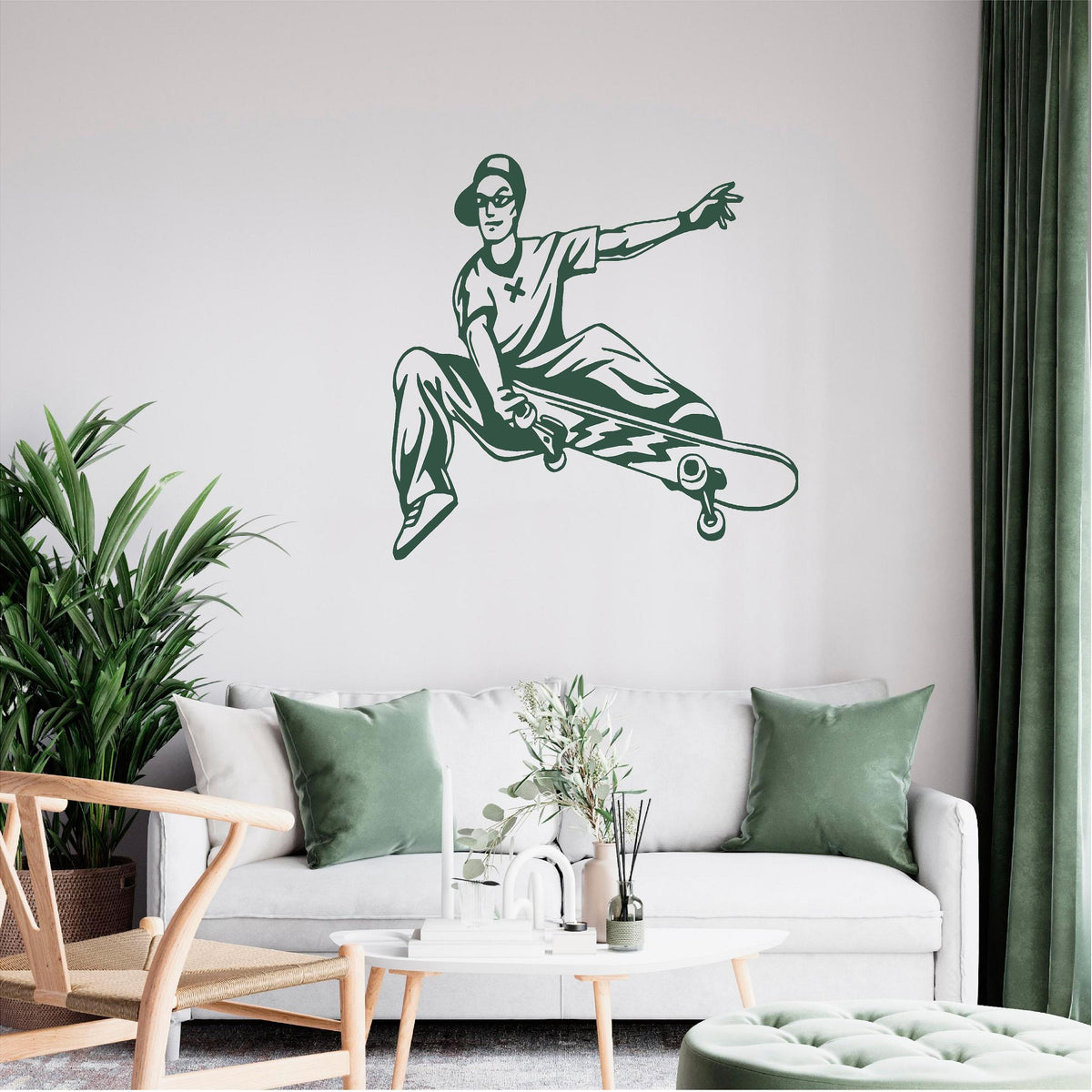 Green skateboarder trick wall decal above a white sofa