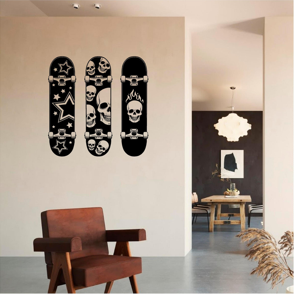 Black skateboard wall decal set above a brown armchair
