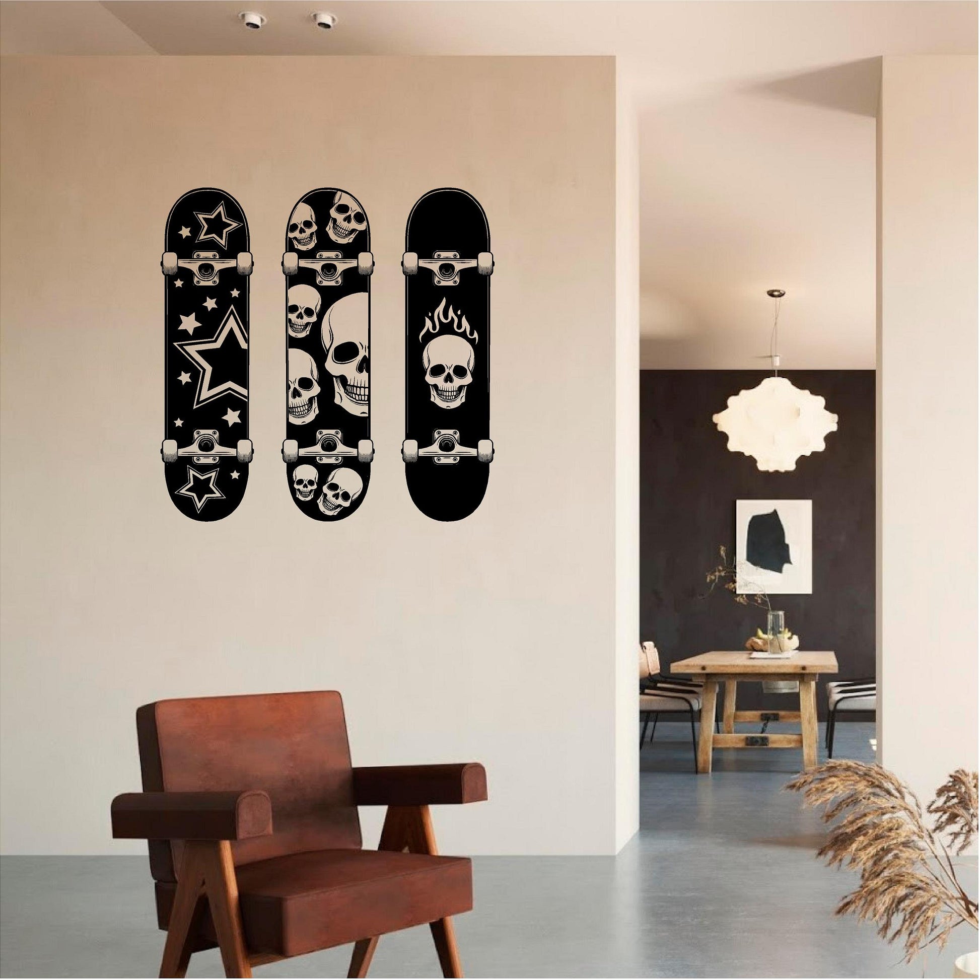 Black skateboard wall decal set above a brown armchair
