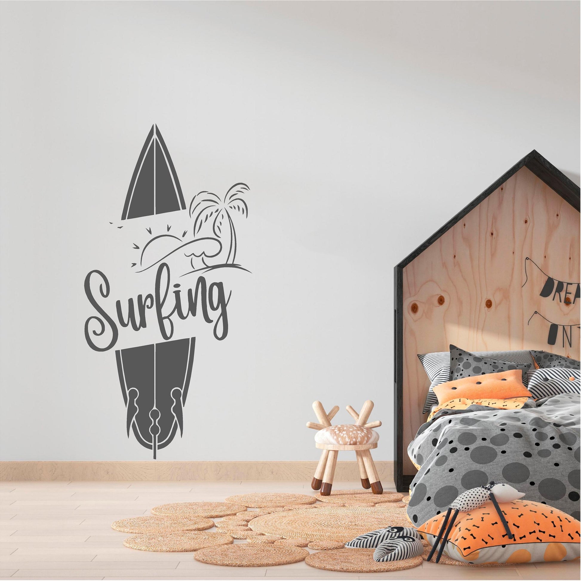 Grey Surfing surfboard wall decal beside a child's bed