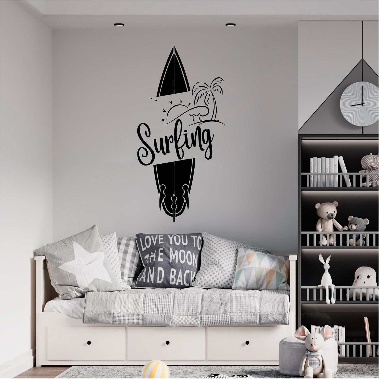 Black Surfing wall decal above a daybed