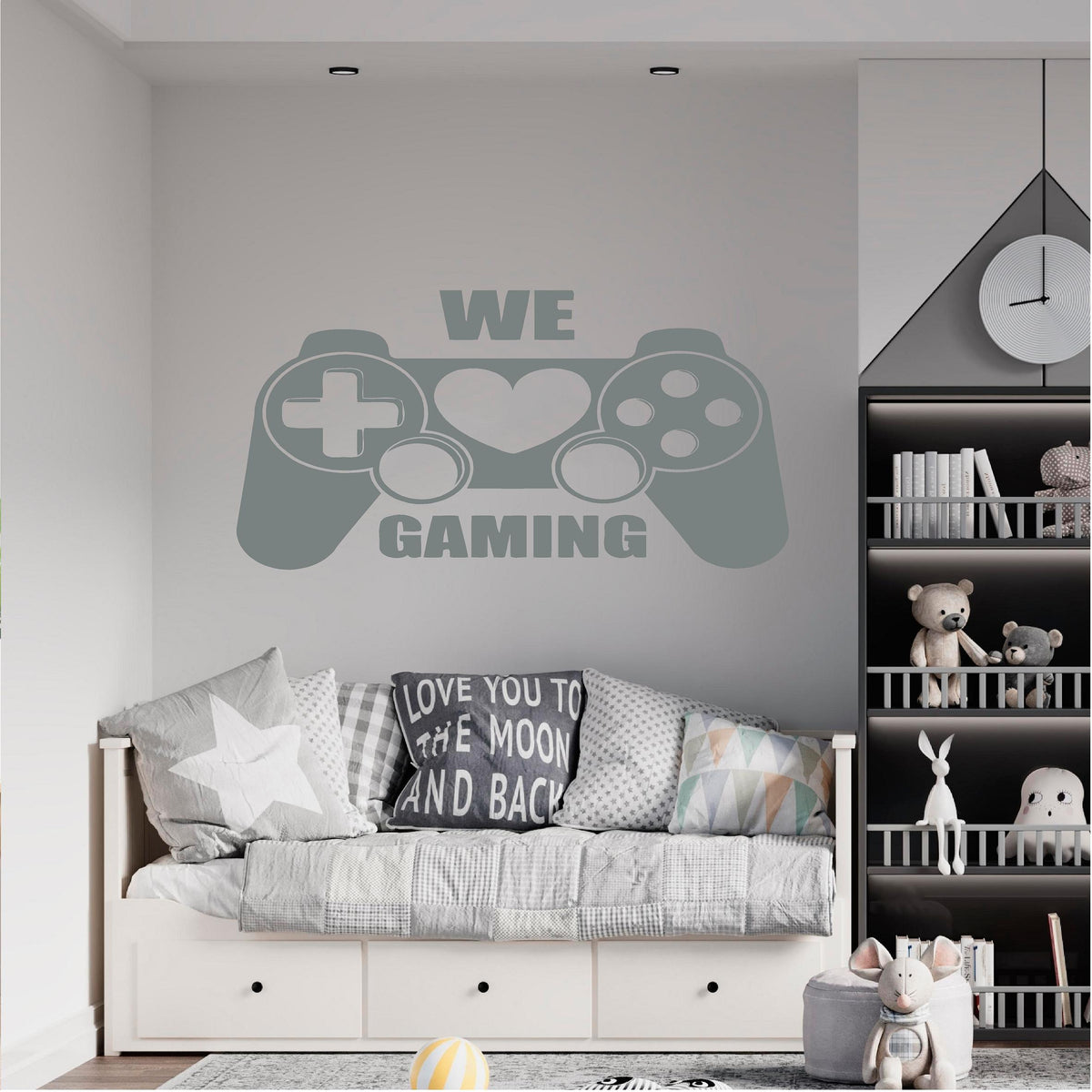 Grey We Love Gaming controller wall decal above a daybed