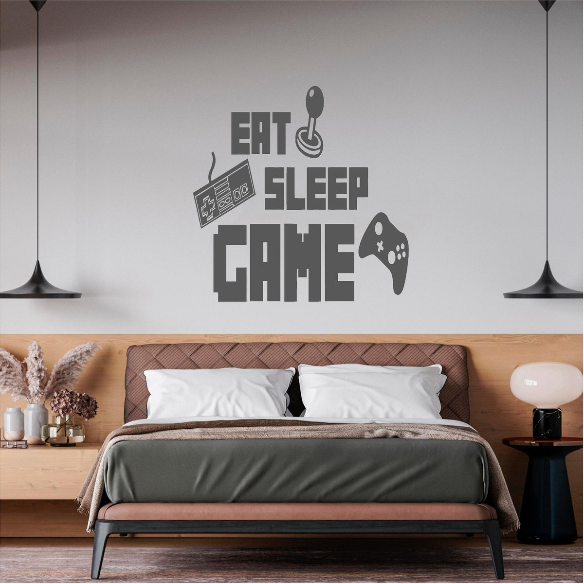 Dark grey Eat Sleep Game wall decal above a double bed