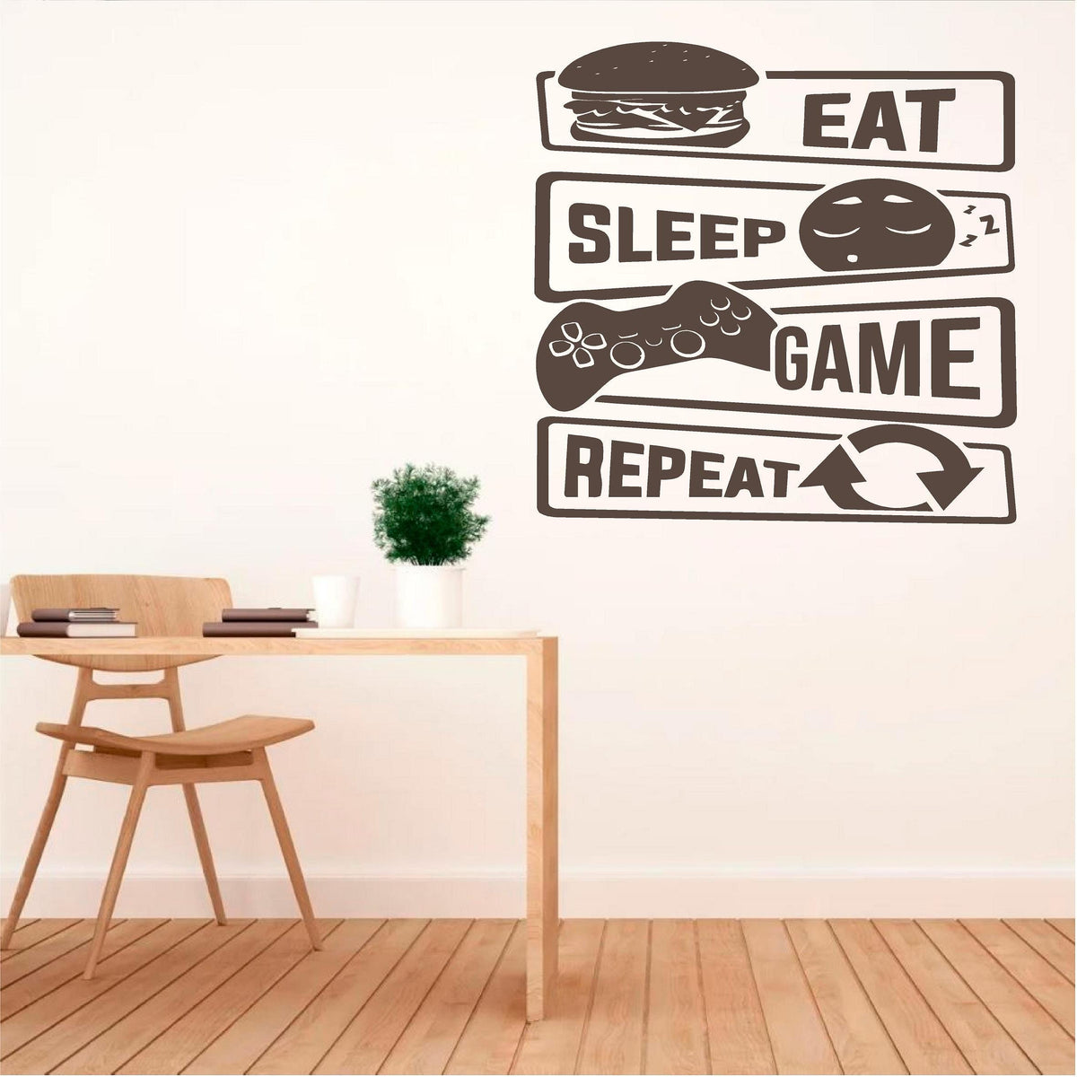 Brown Eat Sleep Game Repeat wall decal beside a wooden desk