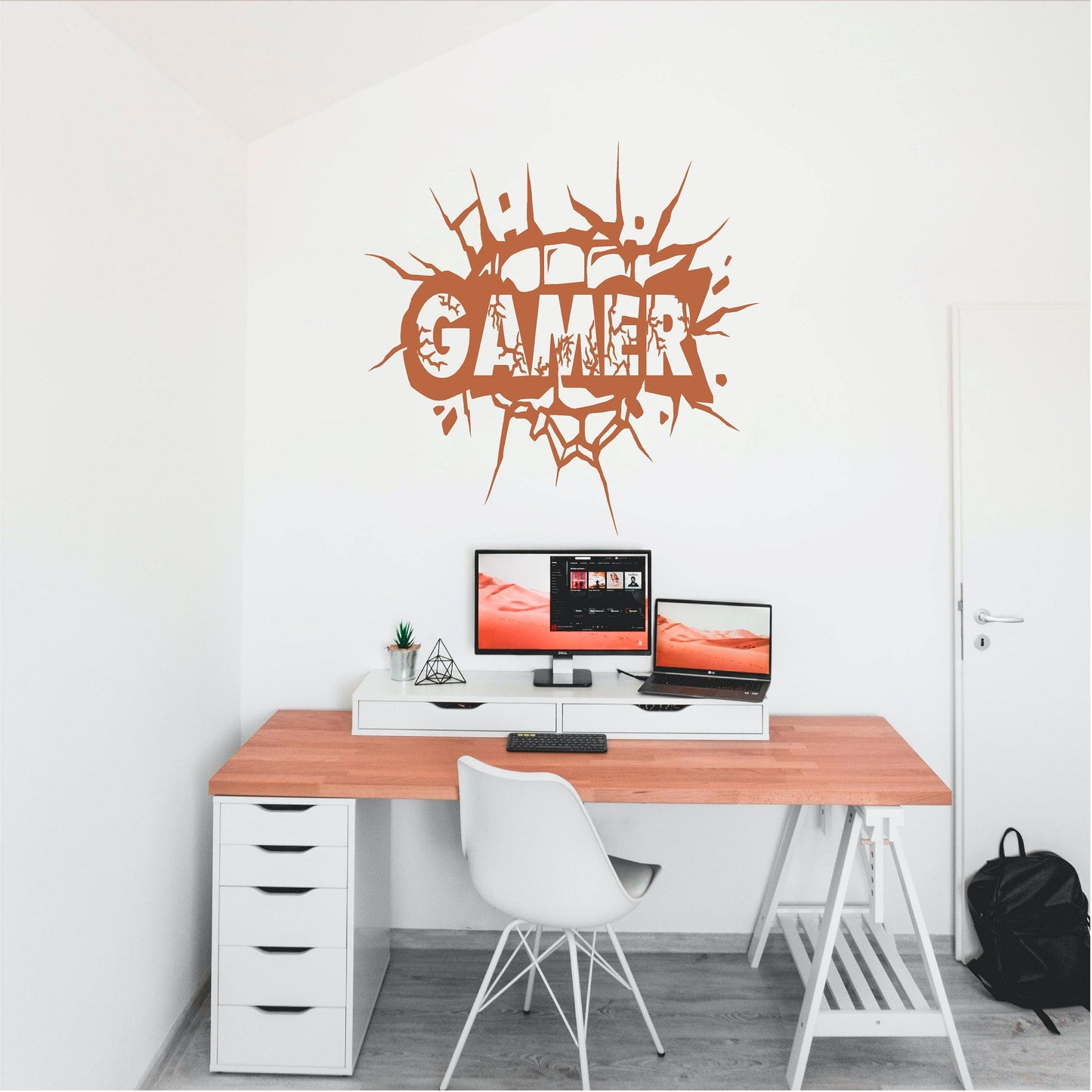 Copper-coloured Gamer cracked-wall decal above a computer desk