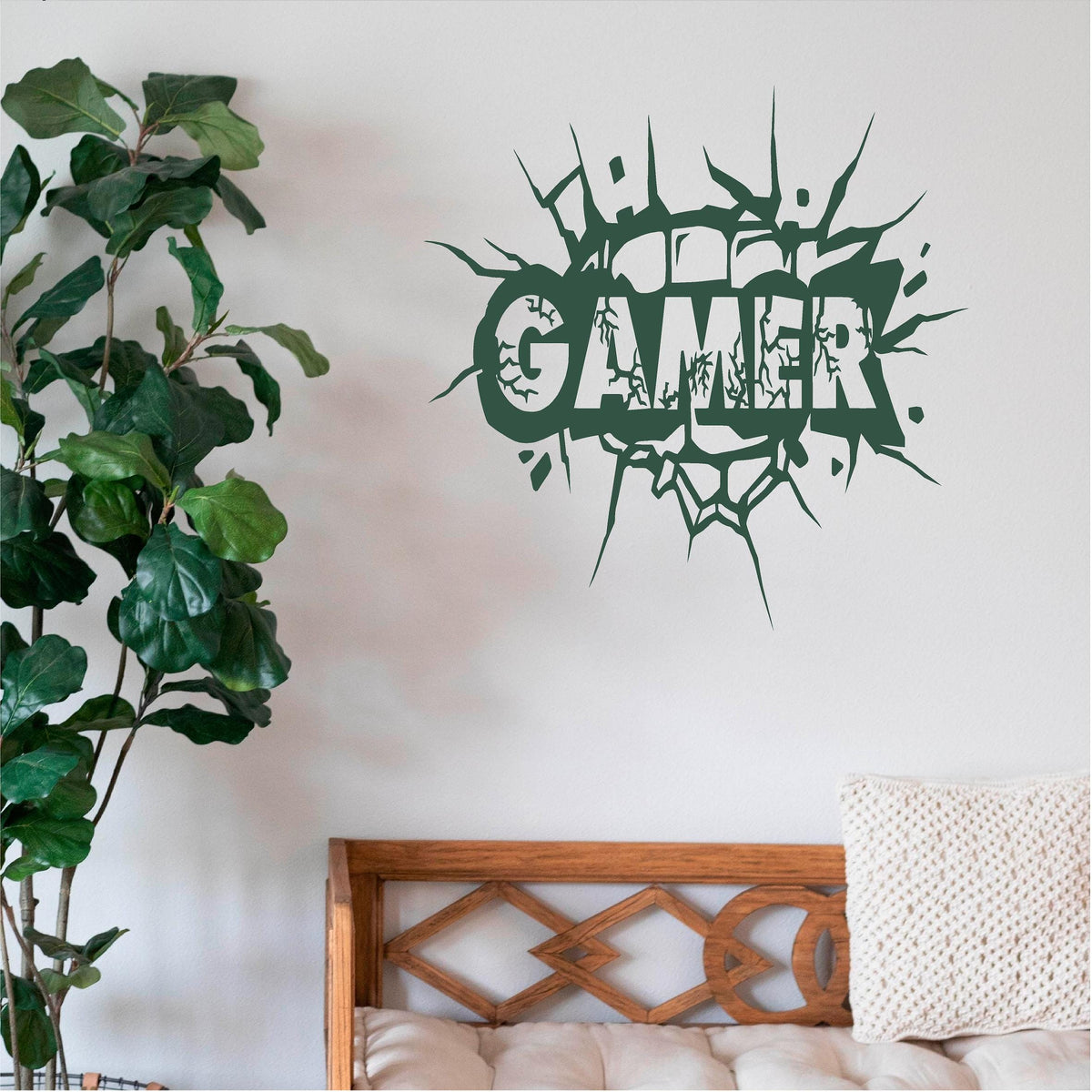 Green Gamer cracked-wall decal above a wooden bench
