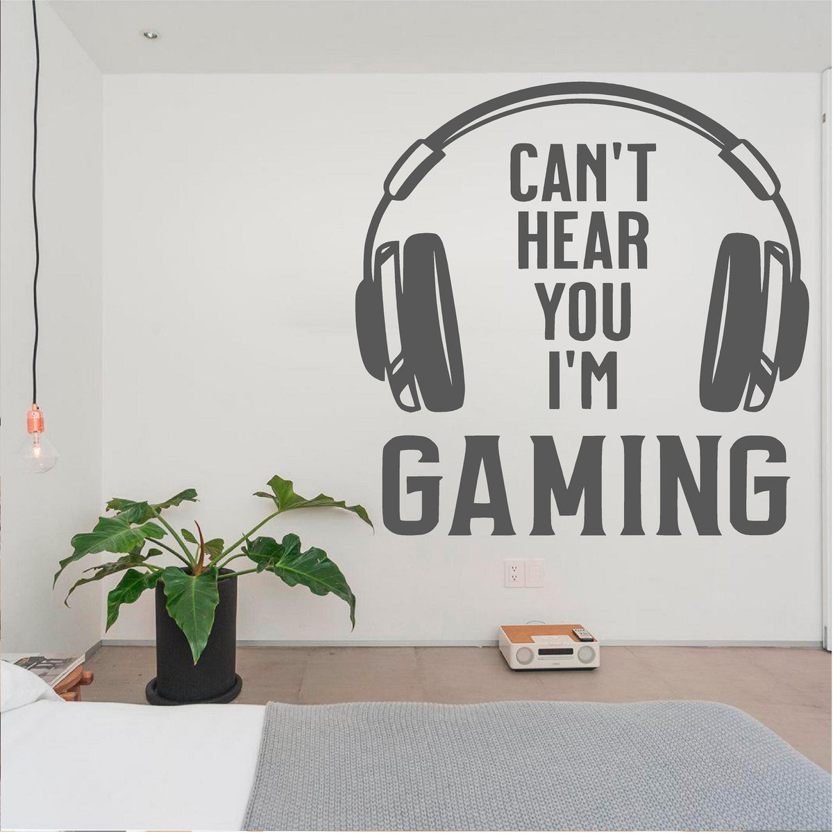 Grey Can't Hear You I'm Gaming wall decal above a bed