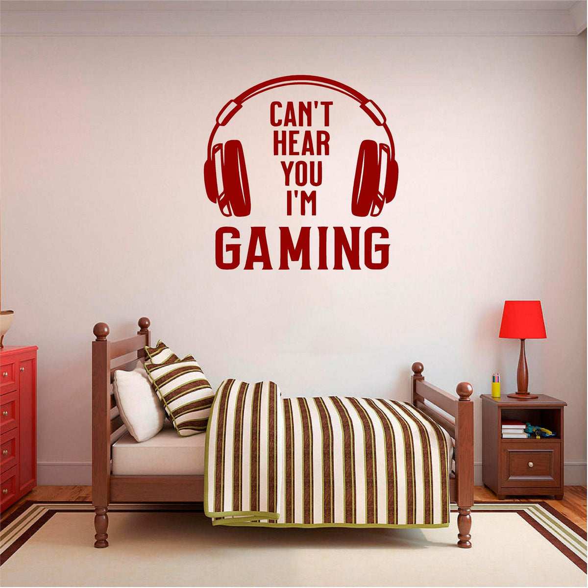 Dark red Can't Hear You I'm Gaming wall decal above a striped bed