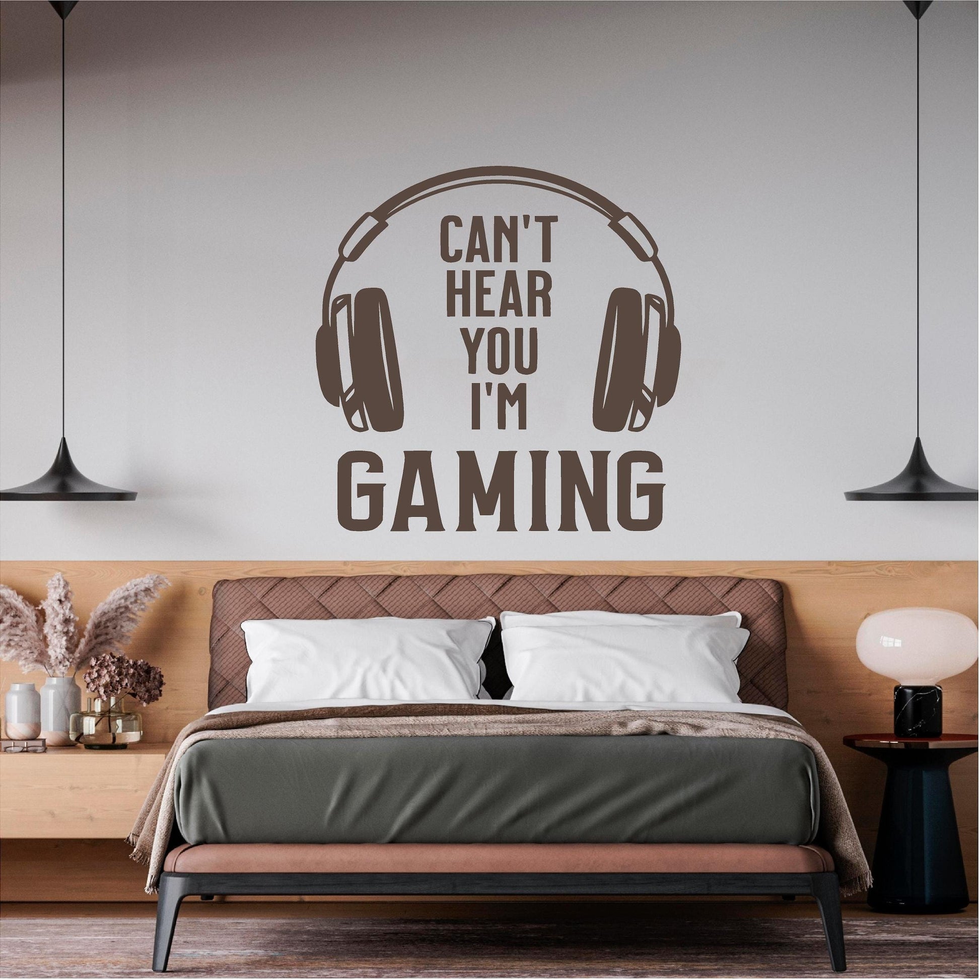 Brown Can't Hear You I'm Gaming wall decal above a double bed
