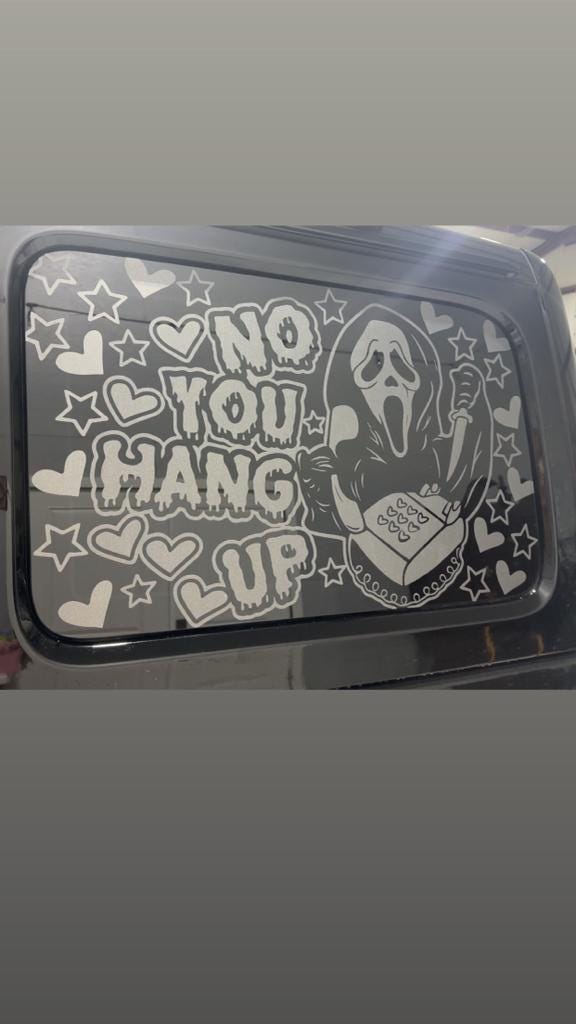 Ghostface window graphic — original project photograph