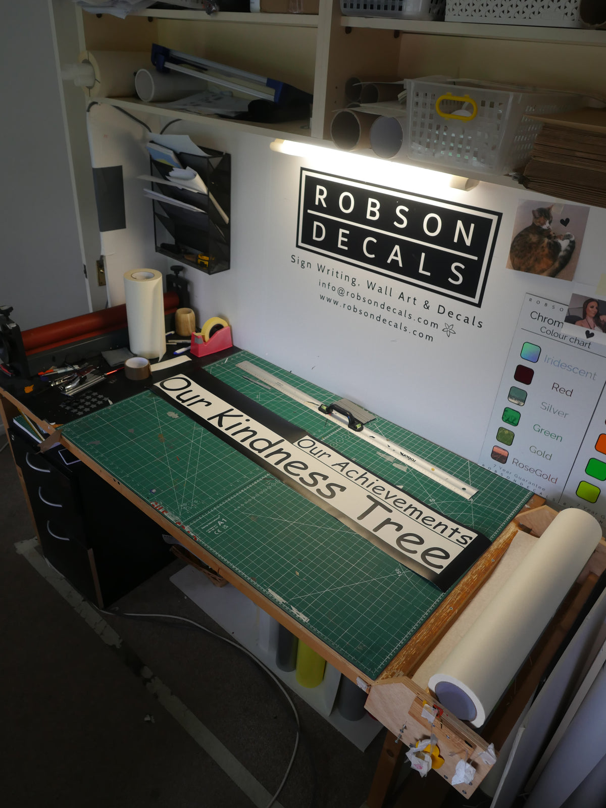 Kindness Tree and Achievements lettering - workshop — prepared vinyl lettering or artwork, workshop photograph