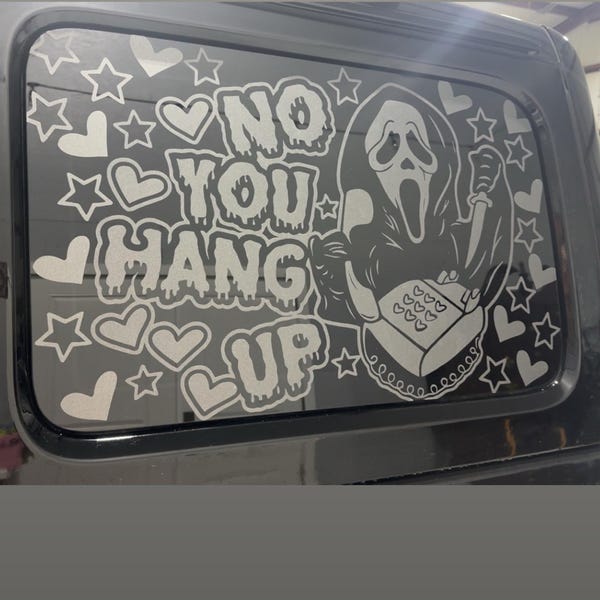 White custom No You Hang Up design on a Jeep window.