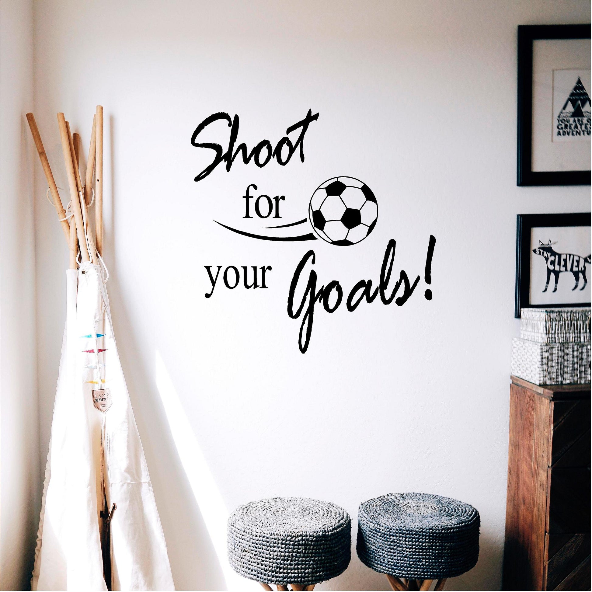 Black Shoot for your Goals football wall decal in a child’s room