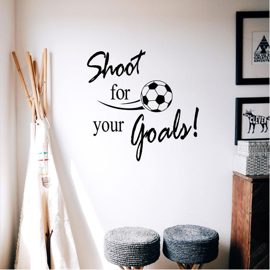 Black Shoot for your Goals football wall decal in a child’s room
