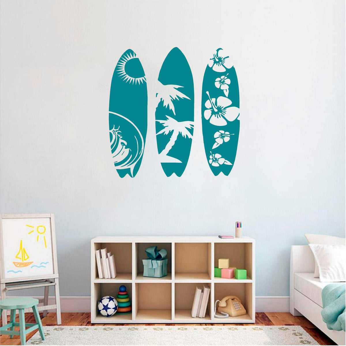 Teal tropical surfboard wall decal set in a bright bedroom