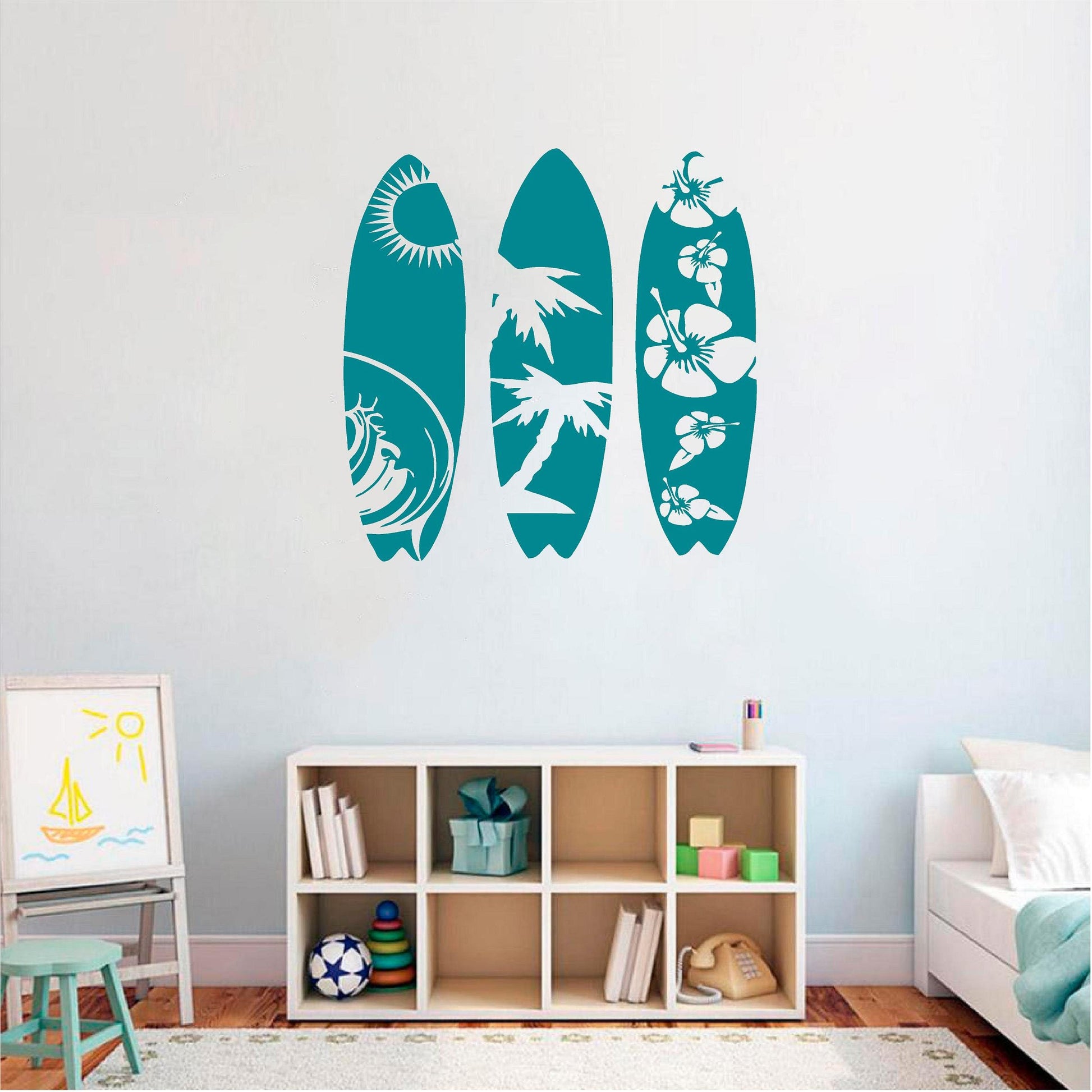 Teal tropical surfboard wall decal set in a bright bedroom