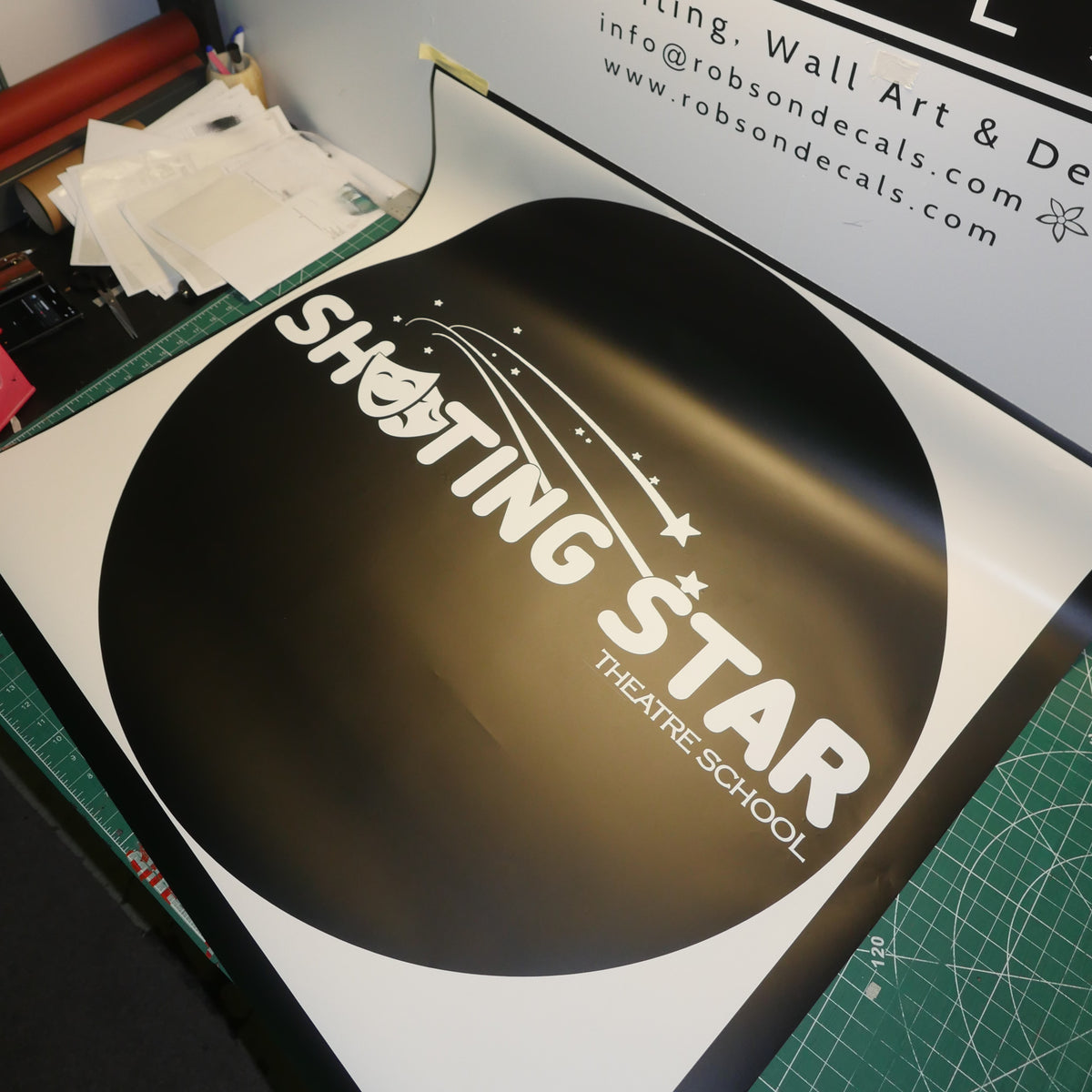 Shooting Star Theatre School — A large circular logo with theatre masks and shooting stars.