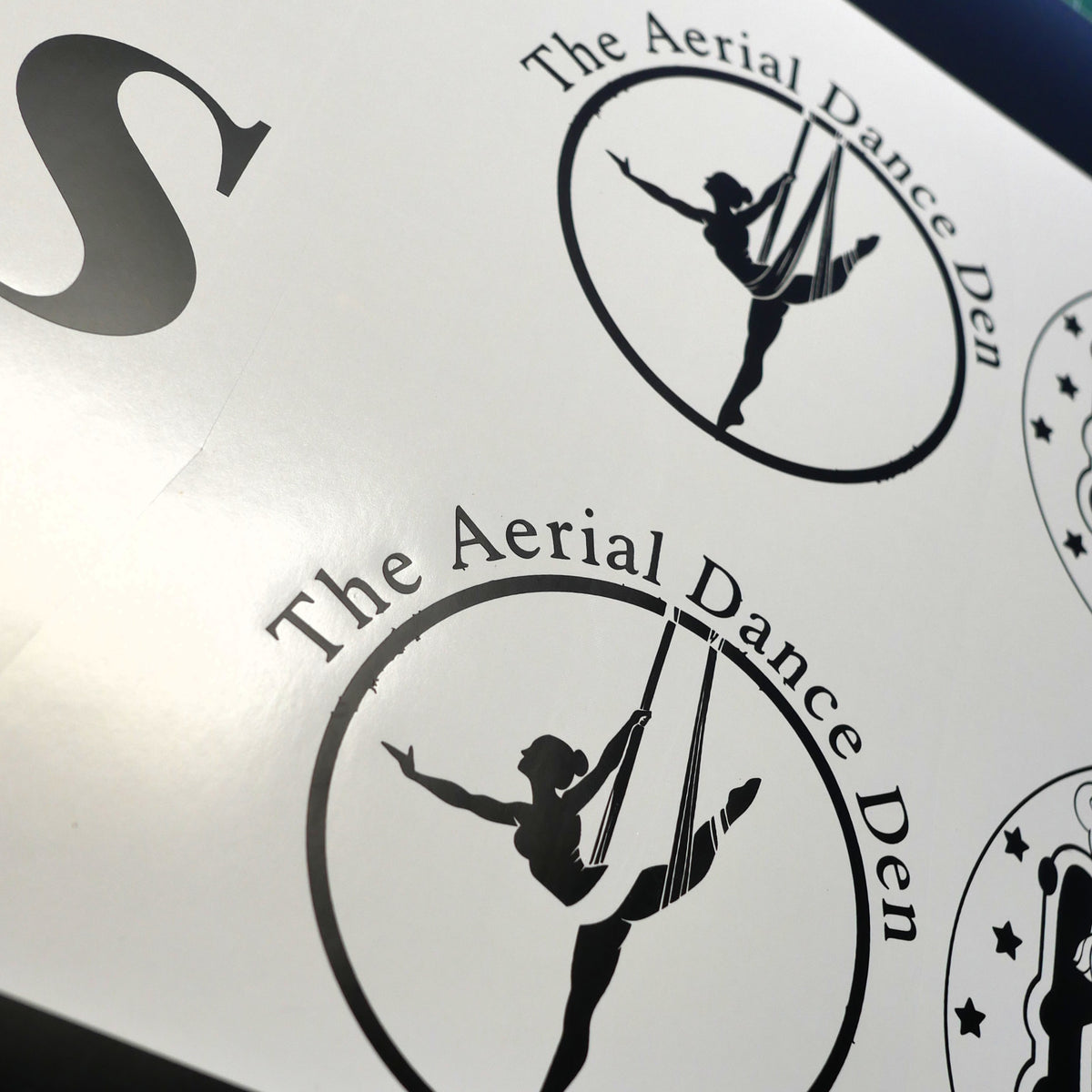 The Aerial Dance Den circular business logos prepared in vinyl in the Robson Decals workshop